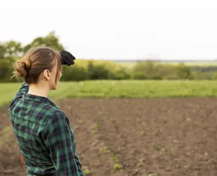 woman-looking-crop-land